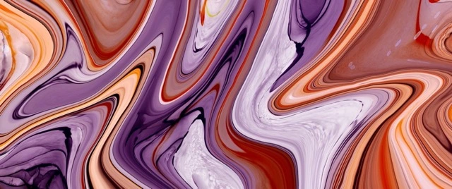 Abstract purple and orange paint mix.
